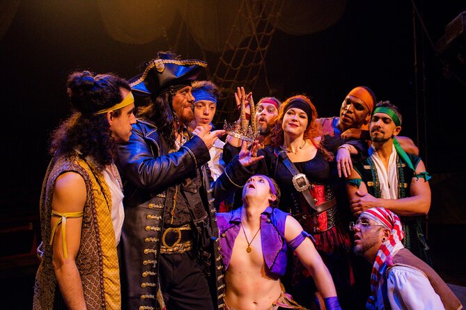 Pirates Dinner Adventure Show in Orlando - The Spanish galleon setting: indoor lagoon, night lighting, and big stage energy